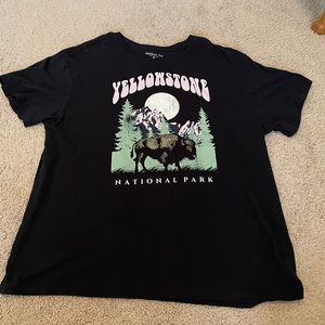An XL rebellious one black t-shirt.